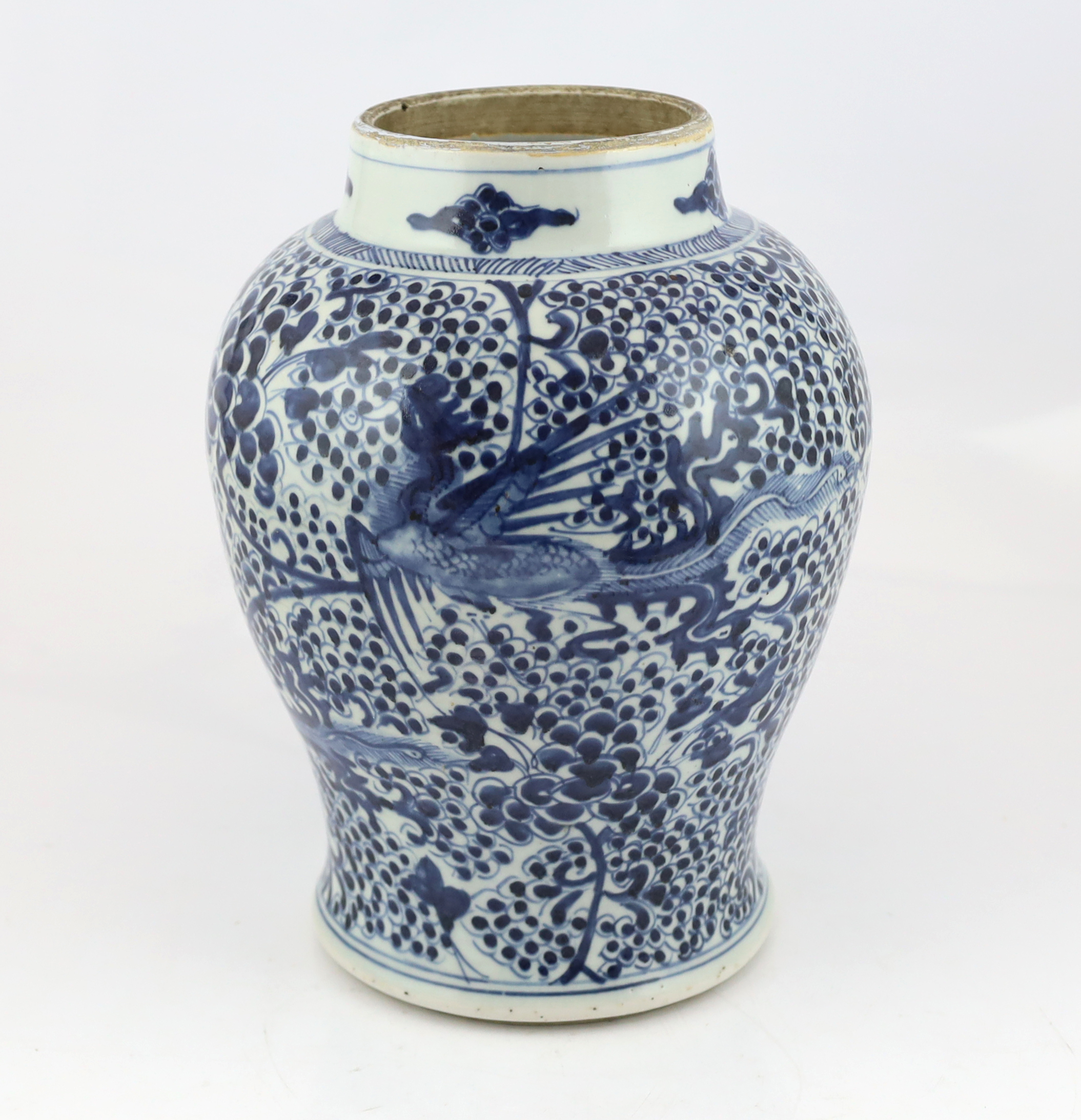 A Chinese blue and white 'Phoenix' baluster vase, Kangxi period, star crack to body